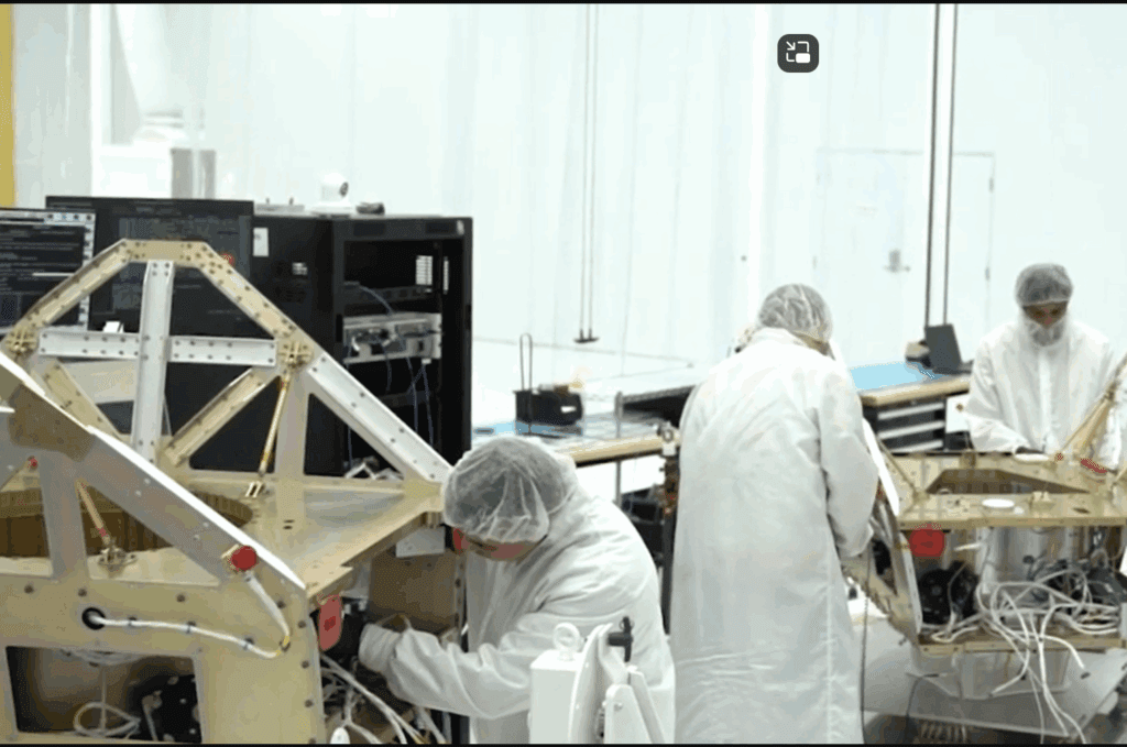 Apex engineers working on company's satellite buses.